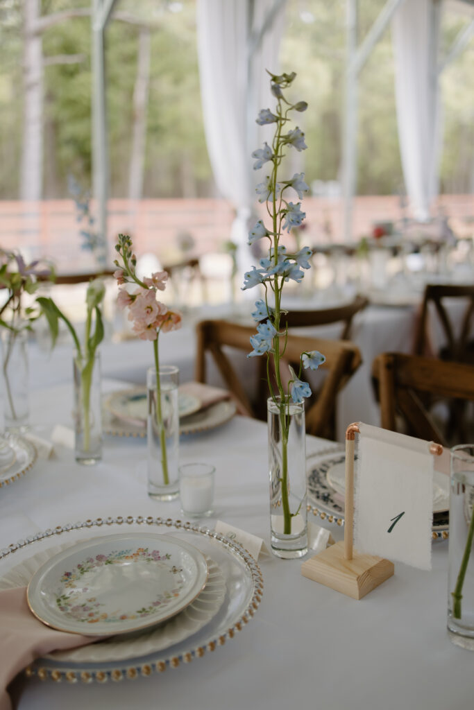 Wedding floral arrangement in dusty rose and dusty blue color